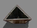 a small metal box with a triangle inside of it