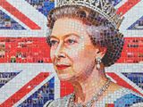 a close up of a mosaic of the queen in front of a british flag