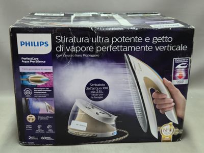 emballage d'un fer à repasser à vapeur Philips posé sur une table