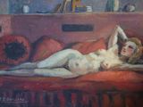 a painting of a nude woman laying on a red couch