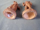 two vases that are sitting on a table