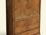 a wooden cabinet with a marble top and drawers