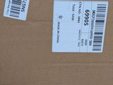 a cardboard box with a price label on it