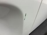 a close up of a sink with a hole in it