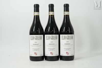 three bottles of wine sitting on top of a white table