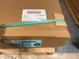 a box that has a green ribbon on top of it