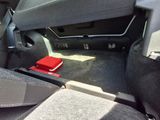 a red object in the back of a car seat