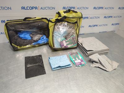 a bag of items sitting on a table next to a pair of gloves and a pair of gloves