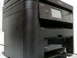 a printer that is sitting on top of a printer