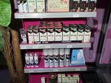 a shelf with various products on it in a store