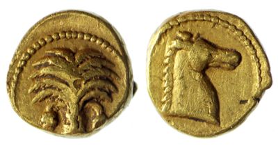 une pièce d'or sur laquelle figurent un cheval et un homme