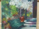 un tableau représentant un banc vert orné de fleurs