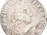 a close up of a coin on a white background