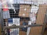 a metal cage with a bunch of boxes in it