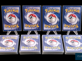 six pokemon cards are sitting on top of each other in front of a black background