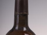 a bottle of wine that is sitting on a table