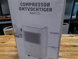 une photo d'un emballage de purificateur d'air posé sur une table