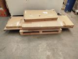 a pile of boxes sitting on a pallet in a warehouse