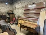 a room with a lot of furniture in it
