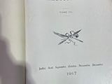 an open book with a picture of two crossed swords on it