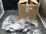 a box with a bunch of silver objects in it
