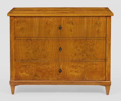 a wooden chest of drawers with three drawers on each side