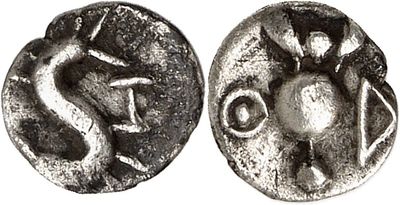 a close up of a coin with a man on it