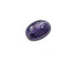 a purple oval stone on a white surface