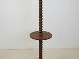 an image of a wooden table with a lamp on top of it