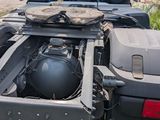 an image of a truck that is parked on the side of the road