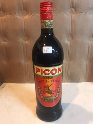a bottle of liquor sitting on a table
