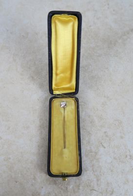 a yellow box with a diamond in it sitting on the floor