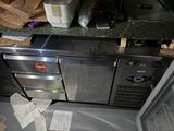 an image of a kitchen with a lot of clutter on the counter