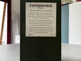 a bottle of capperdonich sitting on a table