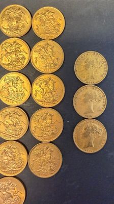 a lot of gold coins that are on the table