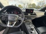 the interior of a car with a steering wheel, dashboard, and dashboard controls