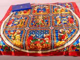 an image of a decorative cushion with a picture of the nativity of jesus