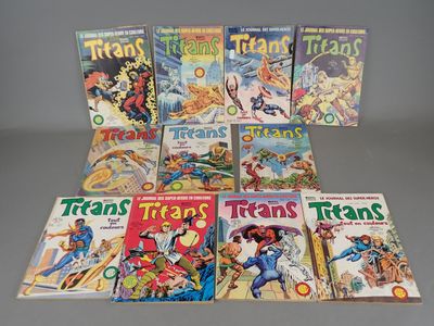 the comics are lined up in a row on the table