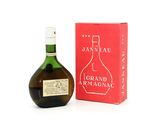 an image of a bottle of grand armagnac next to a box of wine