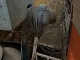 an image of a dirty bathroom with a toilet and a sink