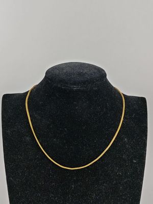 CHAINE en or jaune (750/°°°) à maille tressée.