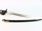 pair of antique swords on a white surface with a black handle