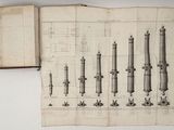 an old book with a bunch of drawings on it