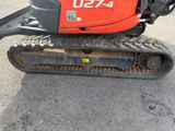 an image of a close up of a small excavator