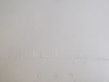 a close up of a white plate with writing on it
