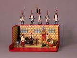 a toy soldier set up on top of a table