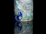 a picture of a vase that is sitting on a table