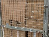a cart with boxes on top of it in a warehouse