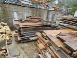 many pieces of wood stacked on top of each other