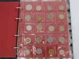 a picture of a red binder with coins in it